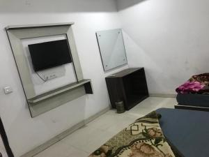 TV a/nebo společenská místnost v ubytování Hotel H5