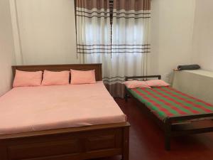 Postel nebo postele na pokoji v ubytování Aurea Galle