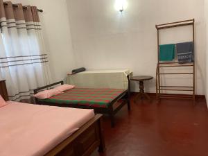 Postel nebo postele na pokoji v ubytování Aurea Galle