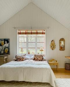 Ένα ή περισσότερα κρεβάτια σε δωμάτιο στο Spacious Farm By Åkulla Beech Forests