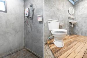Bilik mandi di OYO 693 Tree House Cottage +84 gambar