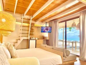 Un televizor și/sau centru de divertisment la Tonsak Resort
