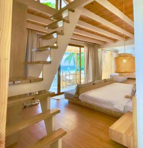 Un pat sau paturi într-o cameră la Tonsak Resort +276 fotografii