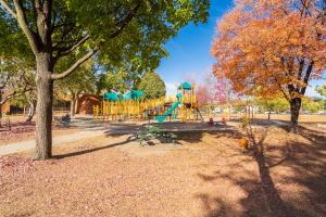 a playground with a slide in a park at Lyndale Church Lodge in Minneapolis