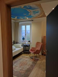 Ένα ή περισσότερα κρεβάτια σε δωμάτιο στο Schloss Kalteneck