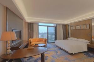 Ένα ή περισσότερα κρεβάτια σε δωμάτιο στο Wuhan Gleetour Hotel +242 φωτογραφίες