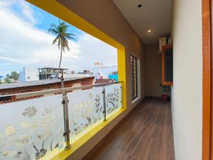 Balkón nebo terasa v ubytování EESHA Inn - A Premium Home stay Near Temple