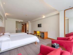 Μια τηλεόραση ή/και κέντρο ψυχαγωγίας στο Jinjiang Inn Style Foshan Creative Industrial Park Wangfujing