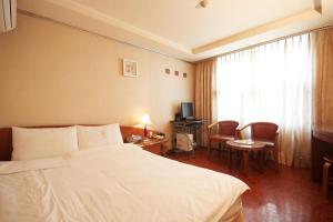 Postel nebo postele na pokoji v ubytování Mirabell Motel