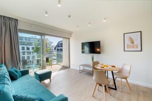 Μια τηλεόραση ή/και κέντρο ψυχαγωγίας στο NORTH Apartments, View Mare Solaris