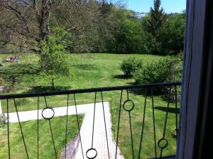 a balcony with a view of a yard at Ferienwohnung J.Weber in Hornbach