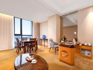 Χώρος καθιστικού στο Jin Jiang Mingcheng Hotel