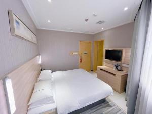 TV a/nebo společenská místnost v ubytování City Comfort Inn Changsha Railway Station