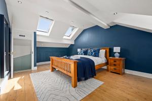 Postel nebo postele na pokoji v ubytování Gorgeous Windermere Home - 3 Bedrooms