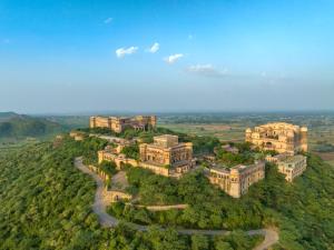 an aerial view of a large building on a hill at Neemrana's - Tijara Fort Palace in Alwar