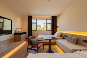 Posezení v ubytování Jiangsu Cuipingshan Hotel