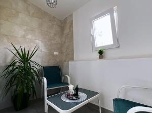 Posedenie v ubytovaní Apartments & Rooms Tapera