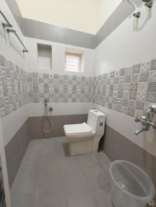 Koupelna v ubytování EESHA Inn - A Premium Home stay Near Temple