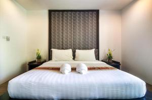 Кровать или кровати в номере Ocean Breeze Residence +40 фотографий