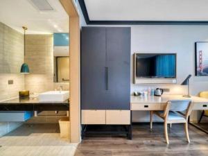 TV a/nebo společenská místnost v ubytování Atour Light Hotel Hangzhou Future Sci-Tech City