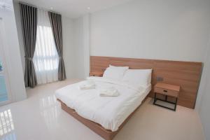 Ένα ή περισσότερα κρεβάτια σε δωμάτιο στο Athenee Hotel Vientiane