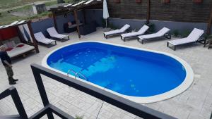 Bazén v ubytování Forest Queen - Village holiday home nebo v jeho okolí + 7 fotografií