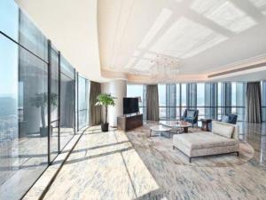 TV a/nebo společenská místnost v ubytování LONGYAN JINGHUA FLIPORT HOTEL