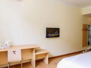 Телевизор и/или развлекательный центр в 7 Days Inn Tianjin Zhongshan Road North Station
