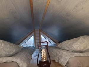 Postel nebo postele na pokoji v ubytování Private tinyhouse - Blue House