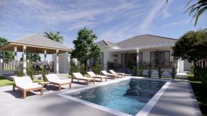Der Swimmingpool an oder in der Nähe von ThaiLife Wellness & Meditation Resort- SHA Plus