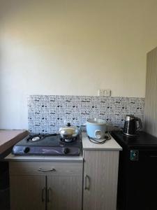 Kuchyň nebo kuchyňský kout v ubytování Cfd Homestay 2 Dungun