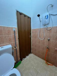 Koupelna v ubytování Cfd Homestay 2 Dungun + 7 fotografií