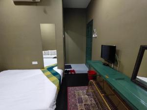 Μια τηλεόραση ή/και κέντρο ψυχαγωγίας στο Oyasumi Hotel