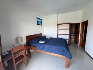 Postel nebo postele na pokoji v ubytování Surf Bali Villa