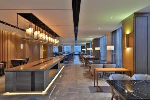 A restaurant or other place to eat at Crystal Orange Hangzhou Alibaba Future Technology City Hotel