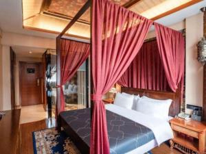 Postel nebo postele na pokoji v ubytování Chonpines Hotel Fuzhou Yuming Avenue Fulin Road + 257 fotografií