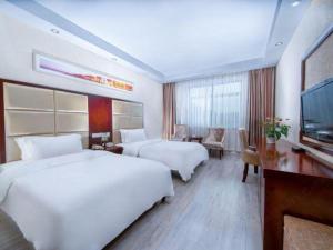 TV a/nebo společenská místnost v ubytování City Comfort Inn Hengyang Nanyue Scenic Spot Temple