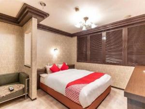 Postel nebo postele na pokoji v ubytování Tabist Hotel Please Kobe