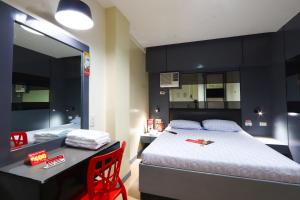 Postel nebo postele na pokoji v ubytování Hotel Sogo - Pasay Rotonda