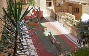 a view of a courtyard with figurines in a building at Cozy Apartment In Oropesa Del Mar in Oropesa del Mar +9 photos