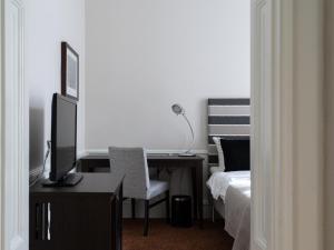 Postel nebo postele na pokoji v ubytování Elite Stora Hotellet Örebro