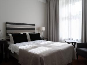 Postel nebo postele na pokoji v ubytování Elite Stora Hotellet Örebro