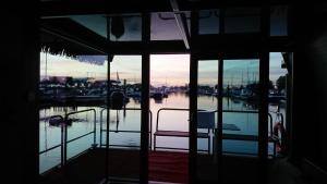 a view of a marina from the inside of a boat at deBieslodge in Drimmelen