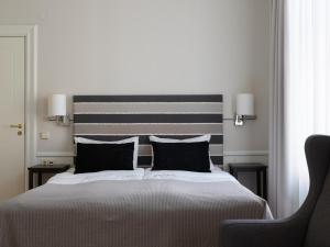 Postel nebo postele na pokoji v ubytování Elite Stora Hotellet Örebro