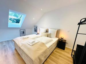 Postel nebo postele na pokoji v ubytování Bonnystay Lörrach l Balcony l Center l Design
