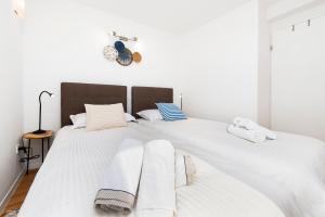 En eller flere senge i et værelse på Cobblestone Comfort in Rovinj