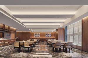 Restoran või mõni muu söögikoht majutusasutuses Intercity Hotel South Central Taiyuan +16 fotot