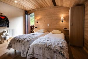 Katil atau katil-katil dalam bilik di Chalet Snow Pearl
