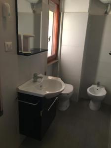 Kúpeľňa v ubytovaní Ospitaci Appartamento Oberdan 113 + 12 fotografií