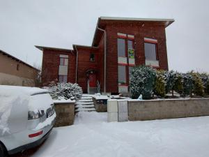 Apartmán v dřevěném domě v zime